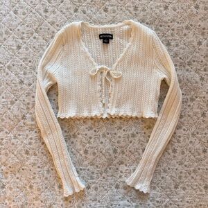 PrettyLittleThing white cropped knit cardigan with tie detail